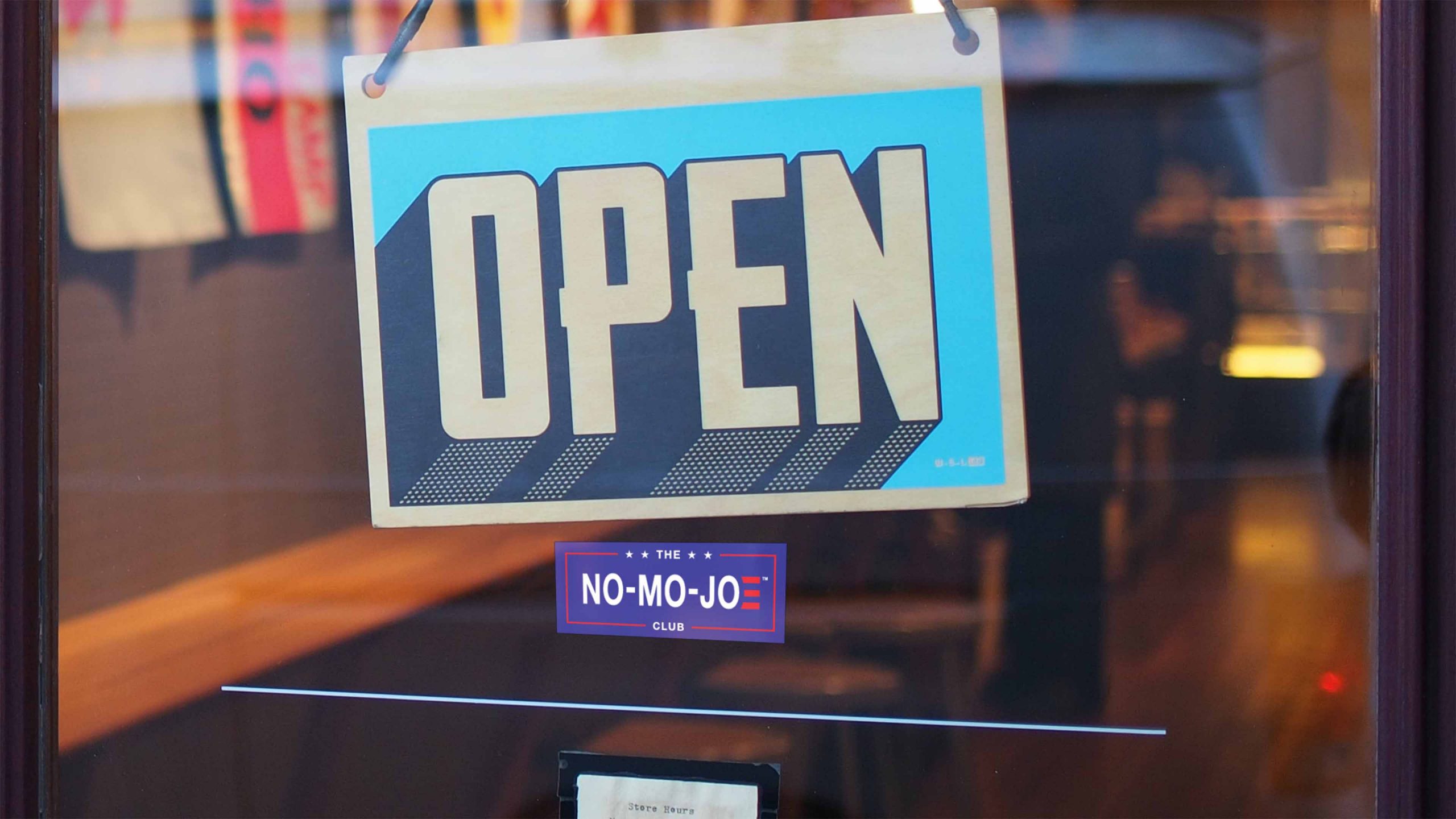 The No-Mo-Joe Club™ window cling on the glass front door of an business displaying an open sign